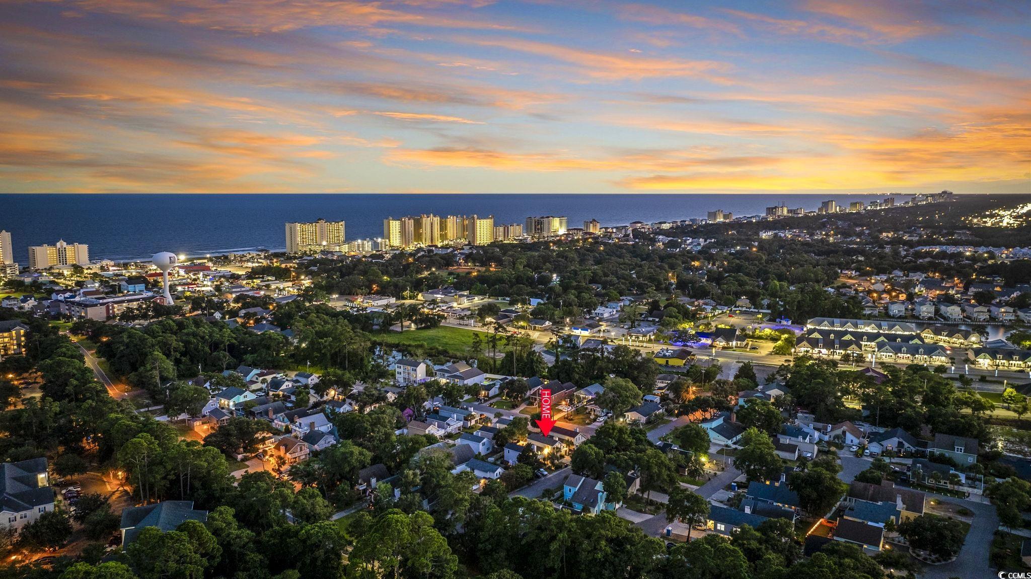 104 Ash Street North Myrtle Beach, SC 29582 - Photo 38 of 39 Aerial view at dusk of a view of city and a water view