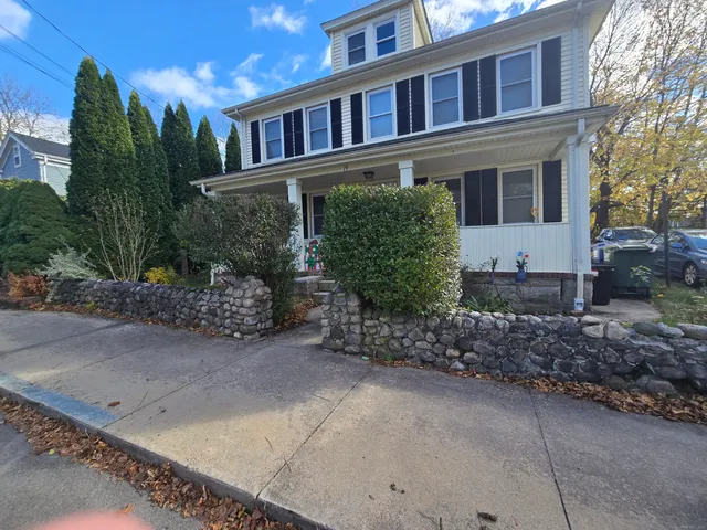 a view of a house with a garden