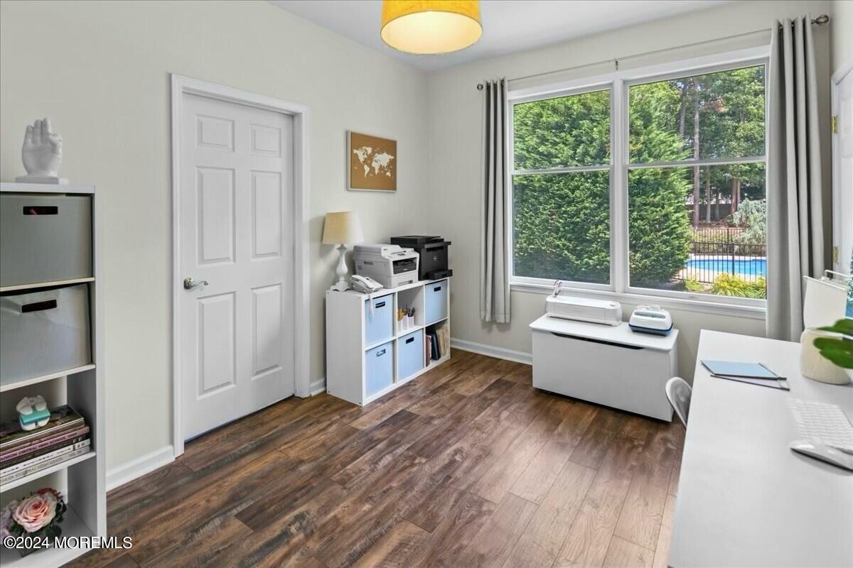 19 Popper Street Manahawkin, NJ 08050 - Photo 12 of 53 a view of a room with wooden floor and a window