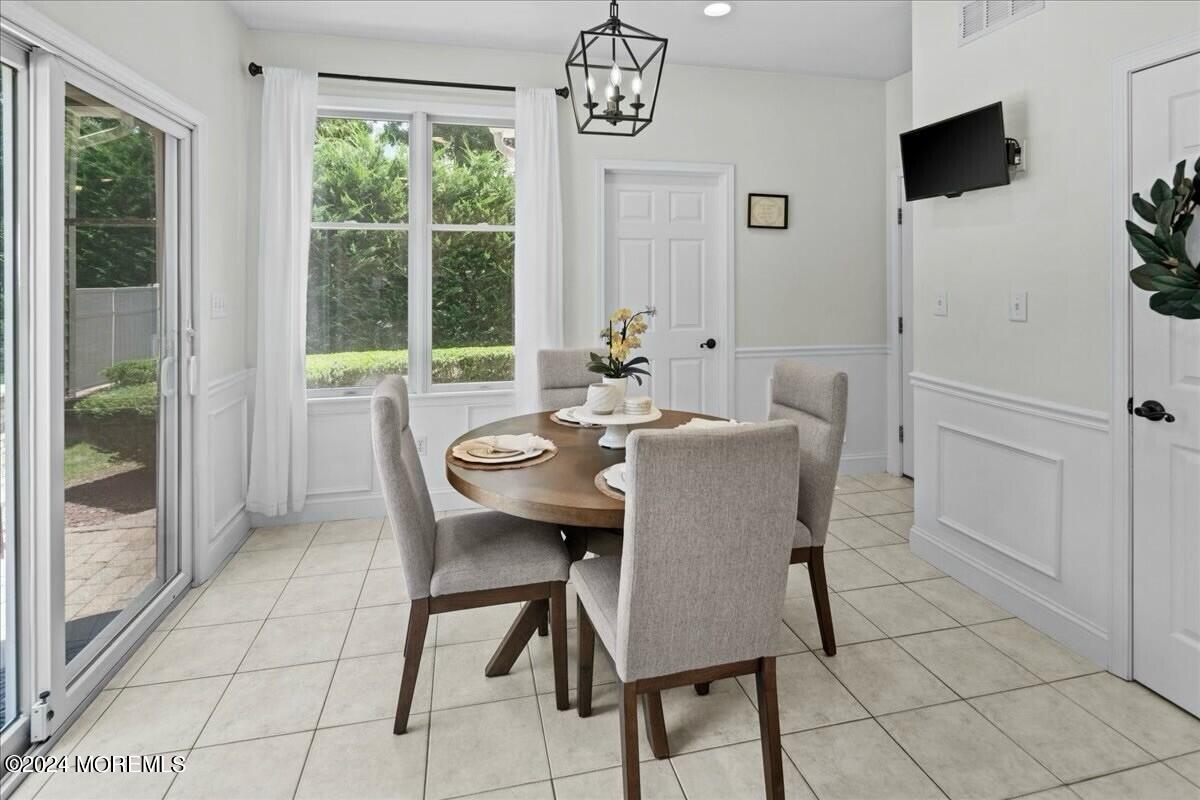 19 Popper Street Manahawkin, NJ 08050 - Photo 16 of 53 a view of a dining room with furniture window and outside view