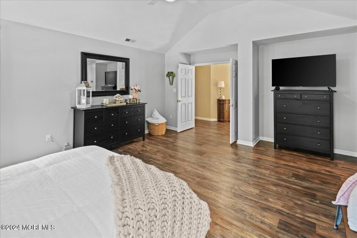 19 Popper Street Manahawkin, NJ 08050 - Photo 22 of 53 a room with a dresser and a television