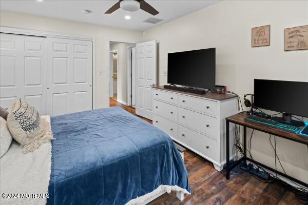 19 Popper Street Manahawkin, NJ 08050 - Photo 29 of 53 a bedroom with a flat screen tv on the dresser and a dresser