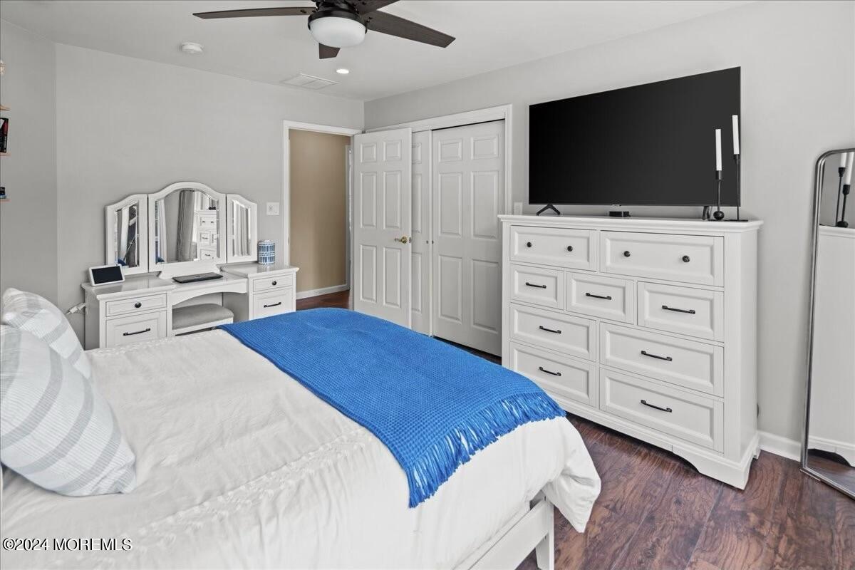 19 Popper Street Manahawkin, NJ 08050 - Photo 31 of 53 a bedroom with a bed and a flat screen tv