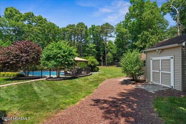 19 Popper Street Manahawkin, NJ 08050 - Photo 34 of 53 a view of a house with a yard