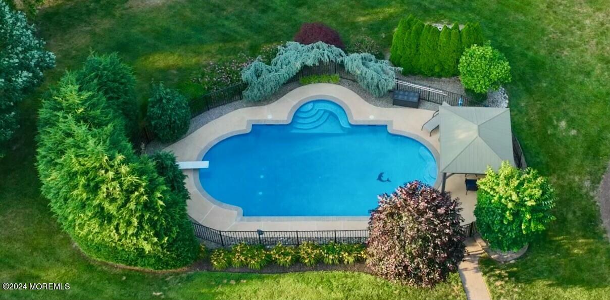 19 Popper Street Manahawkin, NJ 08050 - Photo 37 of 53 an aerial view of a house with garden space and trees all around