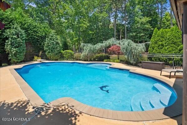19 Popper Street Manahawkin, NJ 08050 - Photo 38 of 53 a view of a swimming pool with an outdoor seating