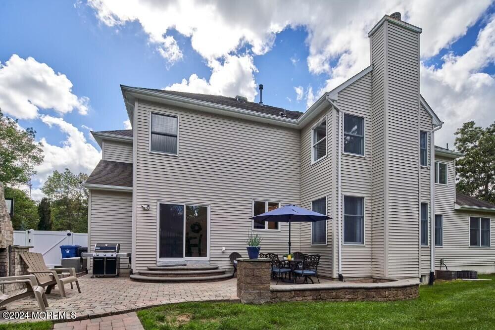 19 Popper Street Manahawkin, NJ 08050 - Photo 44 of 53 a view of a house with backyard