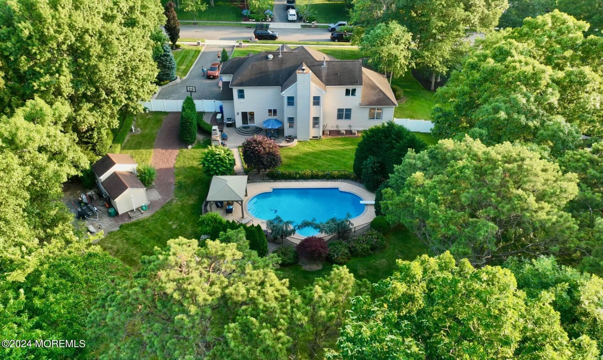 19 Popper Street Manahawkin, NJ 08050 - Photo 46 of 53 an aerial view of a house with yard swimming pool and outdoor seating