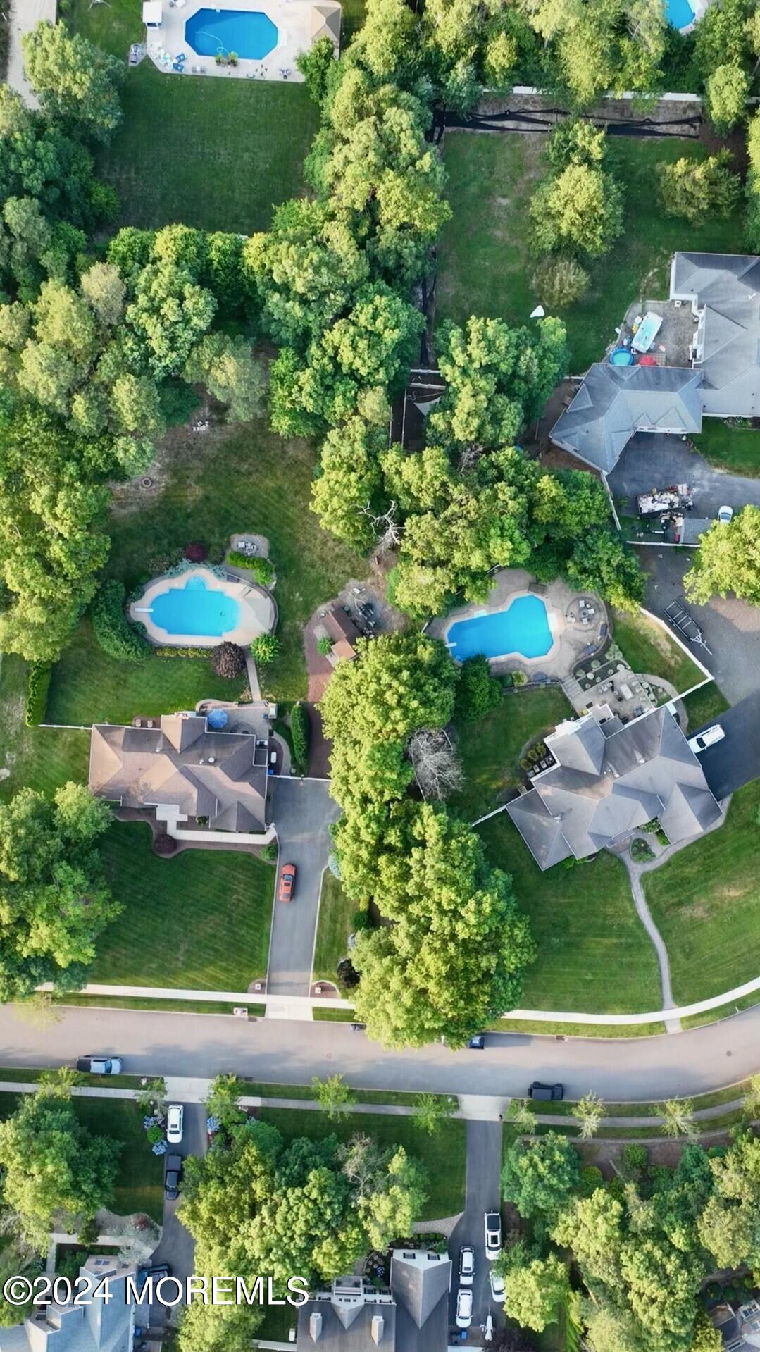 19 Popper Street Manahawkin, NJ 08050 - Photo 51 of 53 a view of a lake with a building