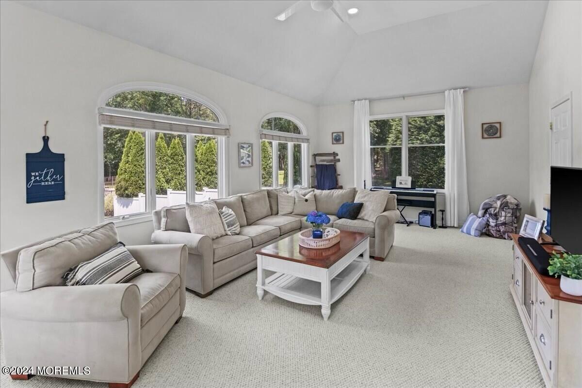 19 Popper Street Manahawkin, NJ 08050 - Photo 7 of 53 a living room with furniture and a large window