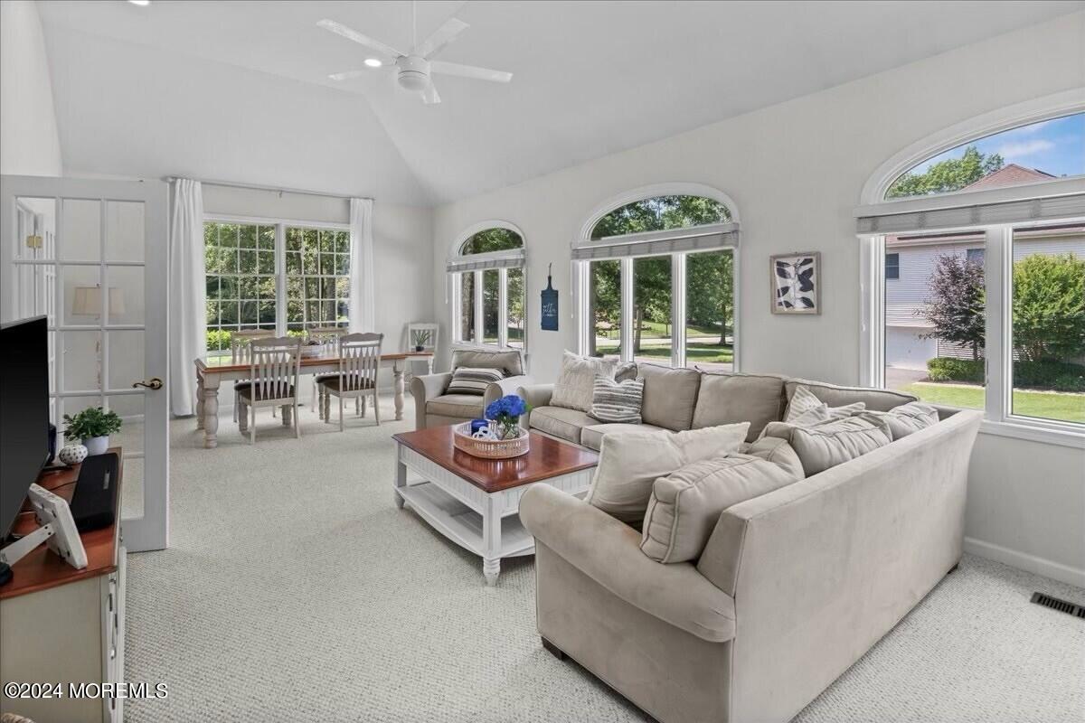 19 Popper Street Manahawkin, NJ 08050 - Photo 8 of 53 a living room with furniture and a large window