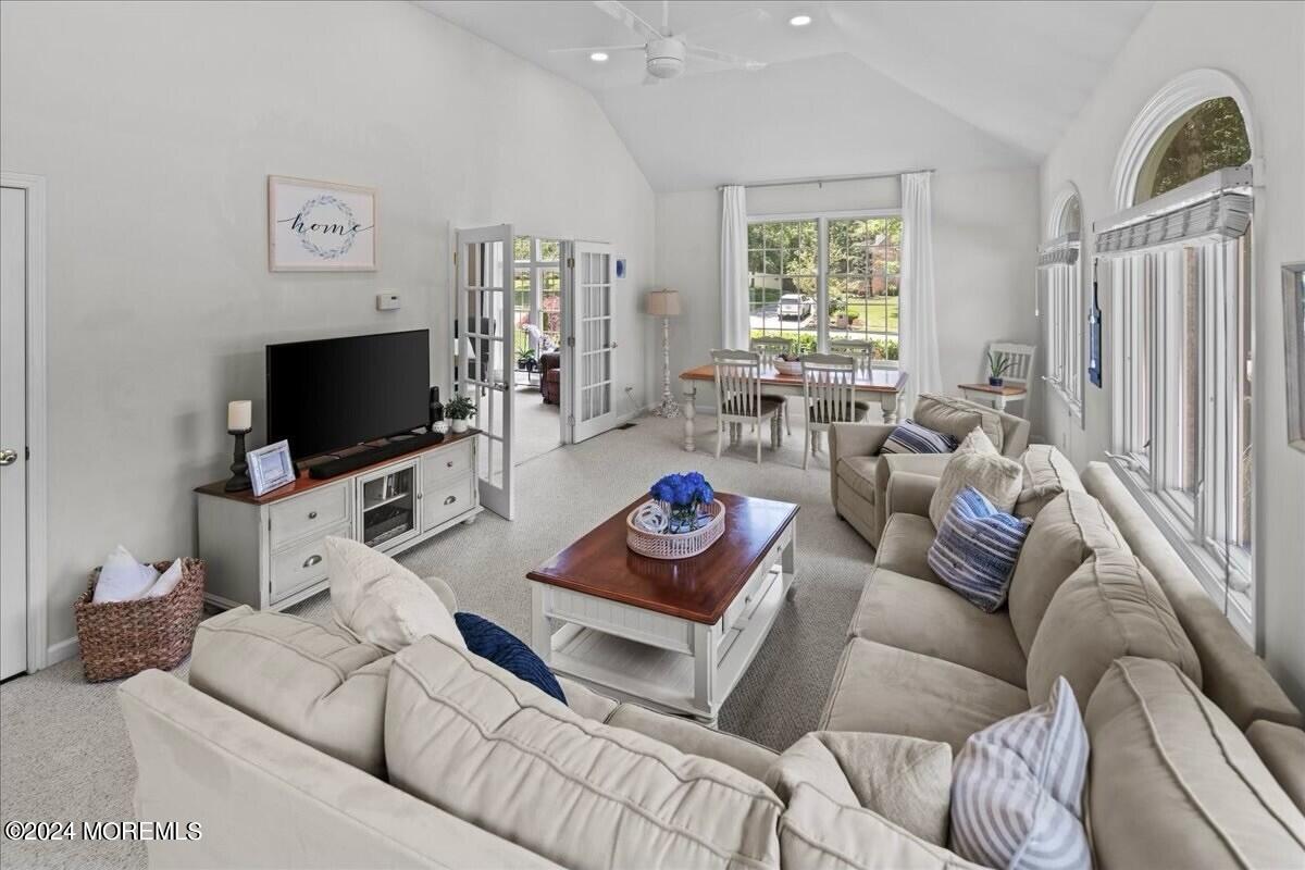 19 Popper Street Manahawkin, NJ 08050 - Photo 9 of 53 a living room with furniture and a flat screen tv