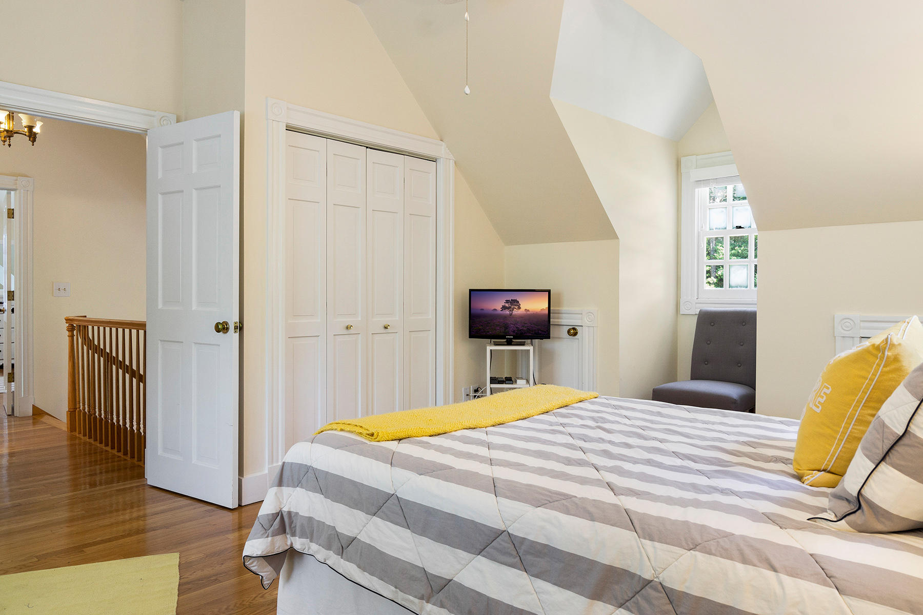 48 Summersea Road Mashpee, MA 02649 - Photo 23 of 41 a bedroom with a bed and wooden floor