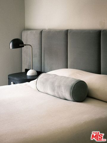 a bathroom with a shower and a bath tub