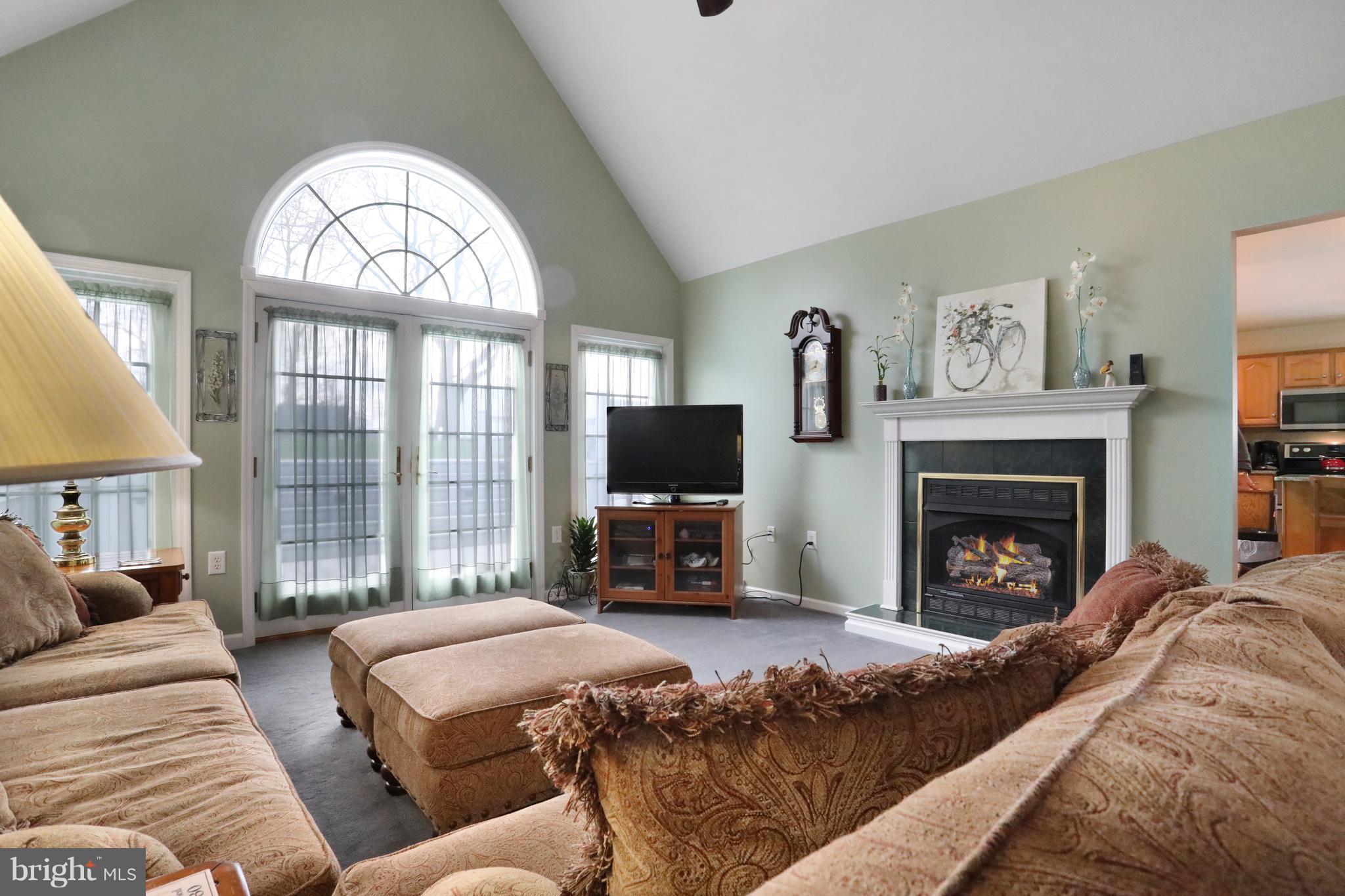 11490 Rhapsody Road Greencastle, PA 17225 - Photo 5 of 30 Gas fireplace in living room adds a cozy touch