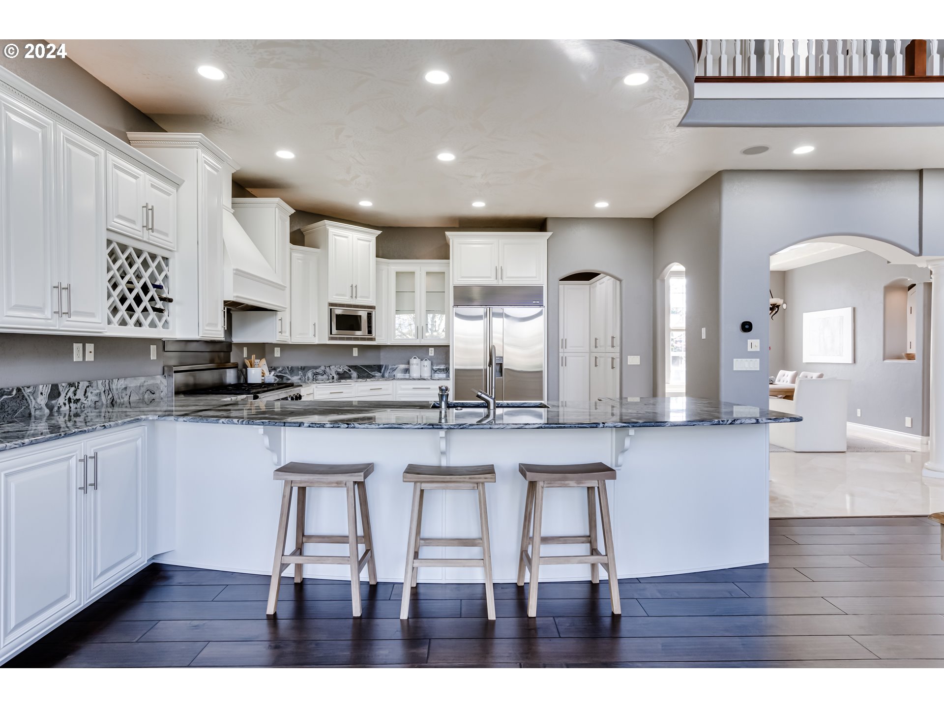 3740 Meadow View Drive Eugene, OR 97408 - Photo 12 of 46 a kitchen with stainless steel appliances granite countertop a sink and cabinets
