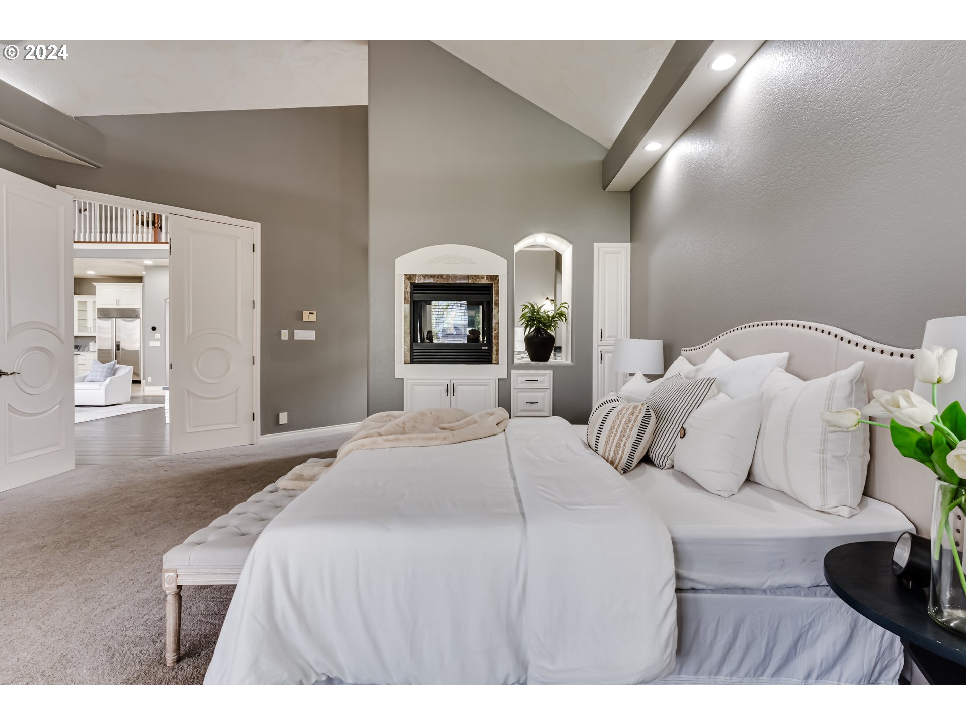 3740 Meadow View Drive Eugene, OR 97408 - Photo 28 of 46 a bedroom with a large bed and a large window