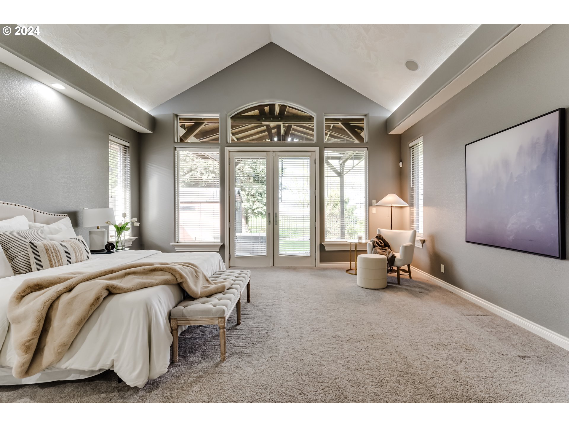 3740 Meadow View Drive Eugene, OR 97408 - Photo 30 of 46 a spacious bedroom with a bed and a large window