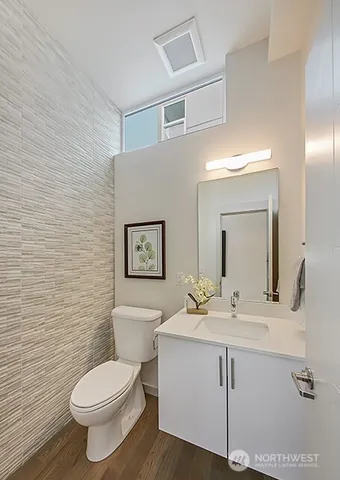 a view of a chair and table in the balcony