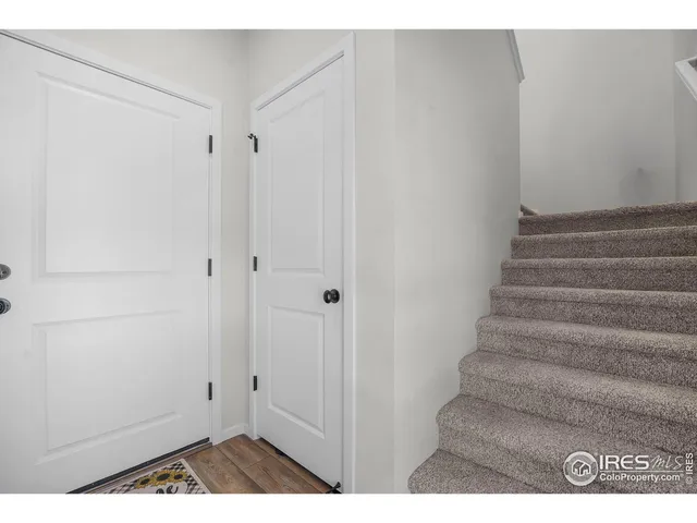 a view of entryway with stairs