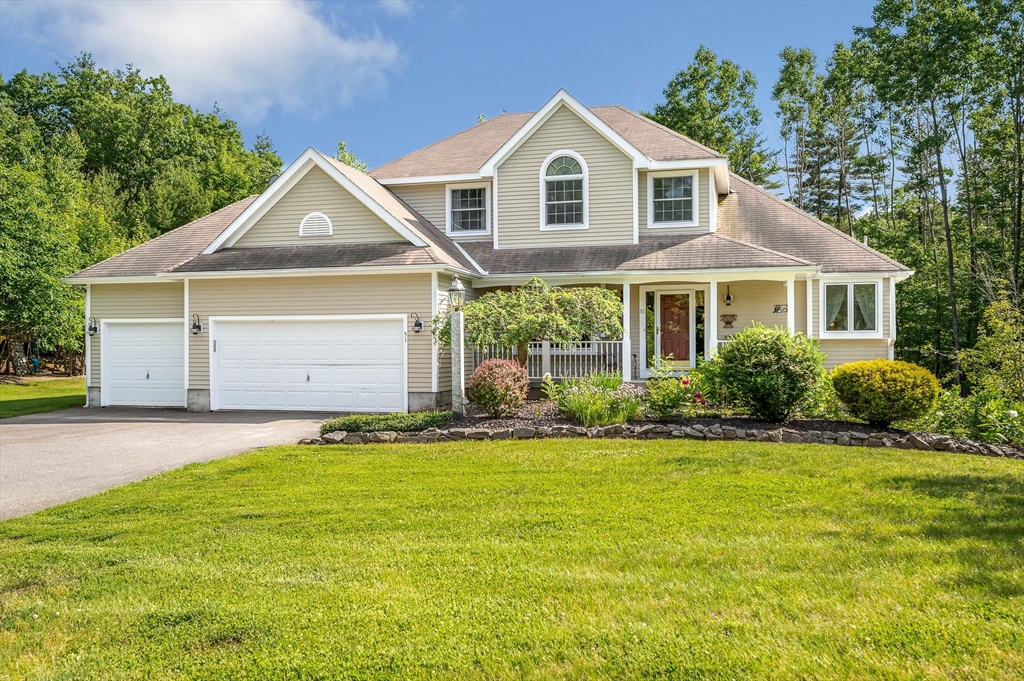 51 Tyler Road Townsend, MA 01469 - Photo 1 of 42 a front view of a house with a yard