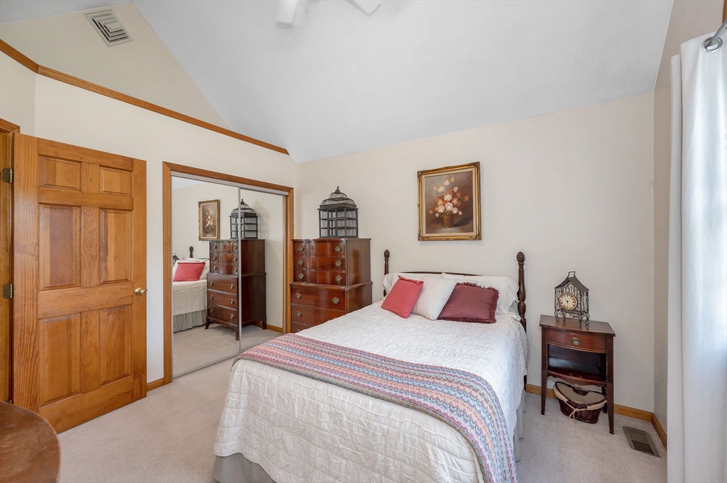 51 Tyler Road Townsend, MA 01469 - Photo 29 of 42 a bedroom with a large bed and a closet