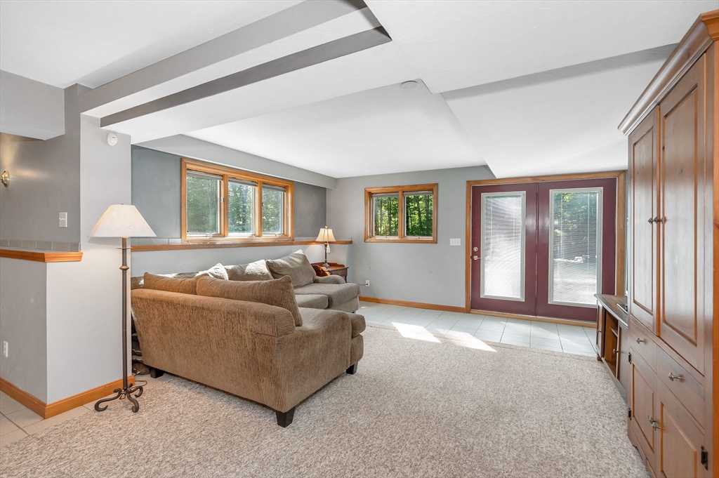 51 Tyler Road Townsend, MA 01469 - Photo 32 of 42 a living room with furniture and windows