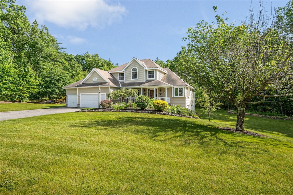 51 Tyler Road Townsend, MA 01469 - Photo 36 of 42 a front view of a house with a yard