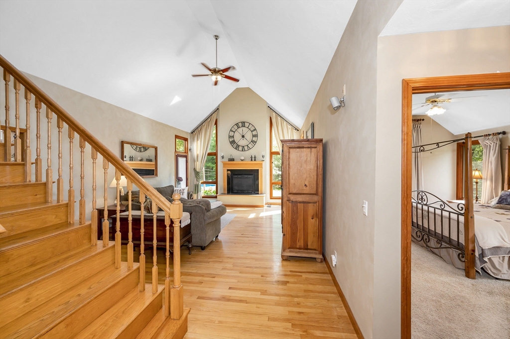 51 Tyler Road Townsend, MA 01469 - Photo 5 of 42 a view of a hallway with wooden floor and staircase