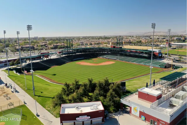 a view of a balcony with a table and chairs