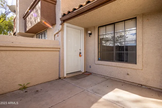 a view of outdoor space and front view of building