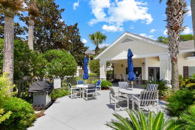 a view of a lake with houses in the back