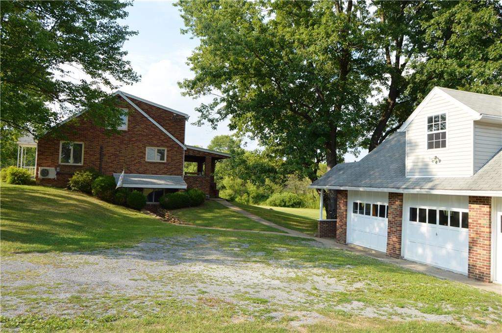 435 Monroe Road Sarver, PA 16055 - Photo 2 of 25 brick exterior, 2 story-3 car garage, walk out basement