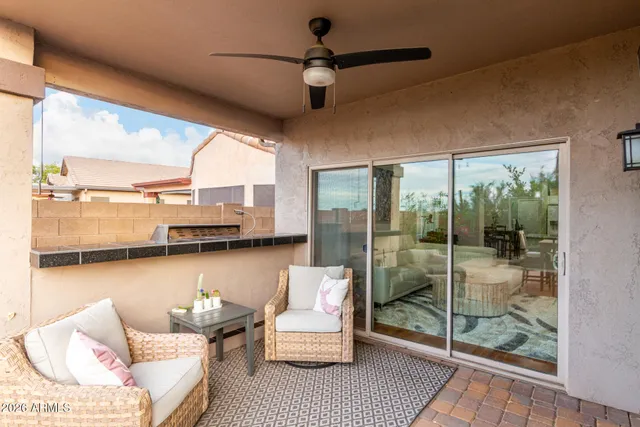 a balcony with view of an ocean