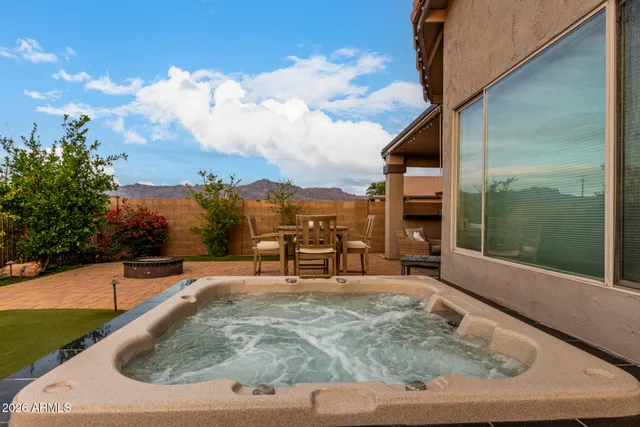 a view of a swimming pool with a sitting space