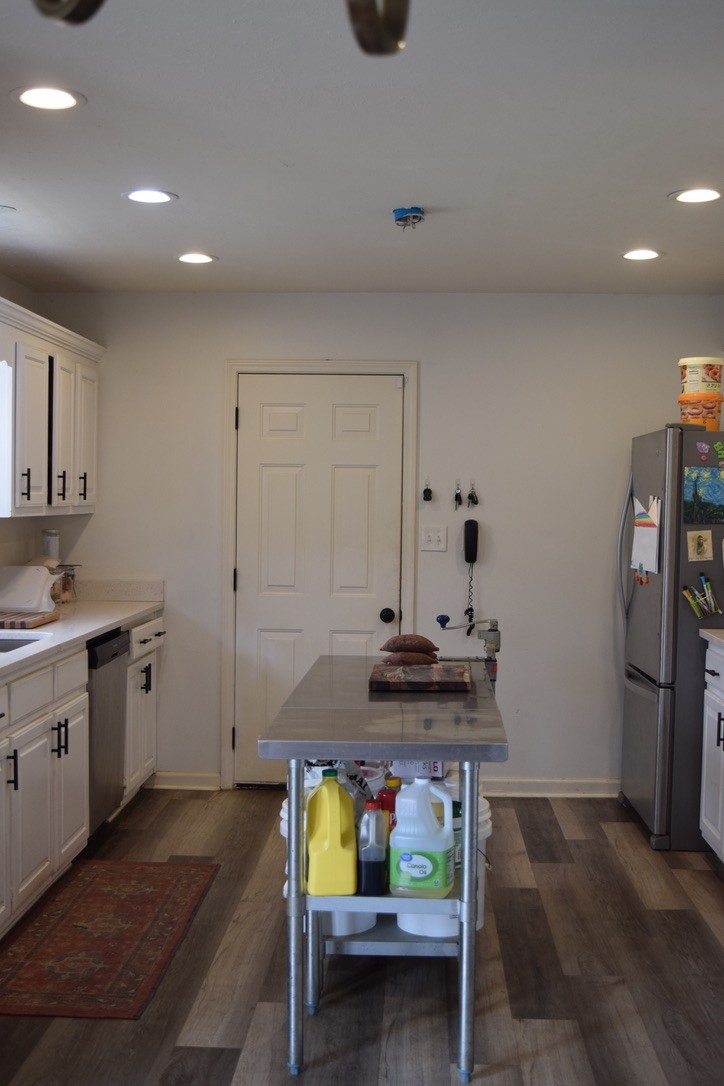 3516 Greens Mill Road Spring Hill, TN 37174 - Photo 5 of 17 a kitchen with stainless steel appliances kitchen island granite countertop a sink and cabinets