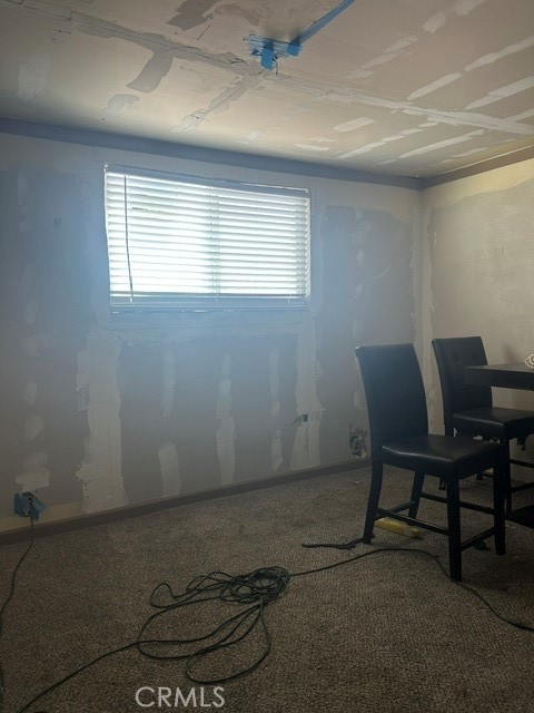 35057 Birch Road Barstow, CA 92311 - Photo 11 of 15 a view of a room with a wooden table and chairs