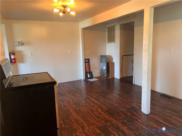 a view of a storage & utility room with wooden floor