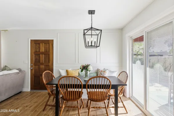 a view of a dining room with furniture window and outside view