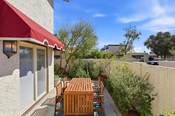 a view of a street with a building in the background