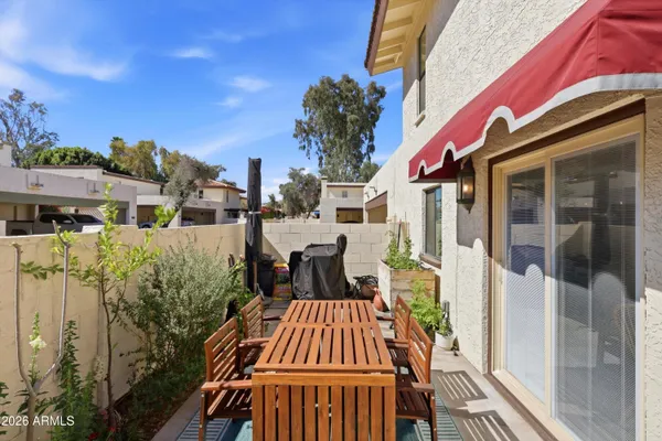 a view of balcony with furniture