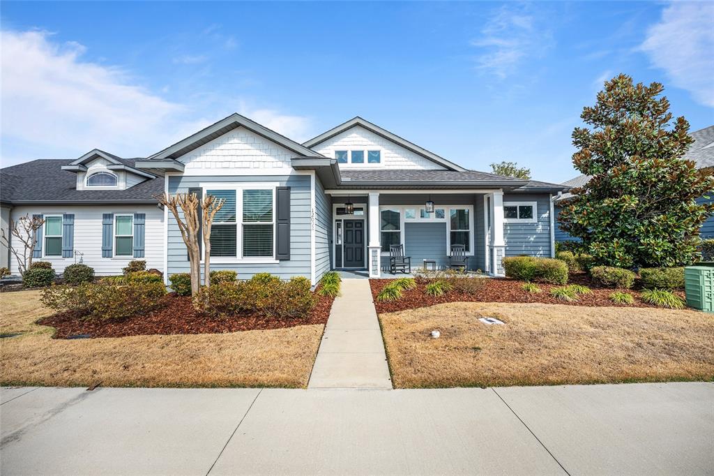 12092 Southwest 29th Place Gainesville, FL 32608 - Photo 1 of 38 a view of house with yard