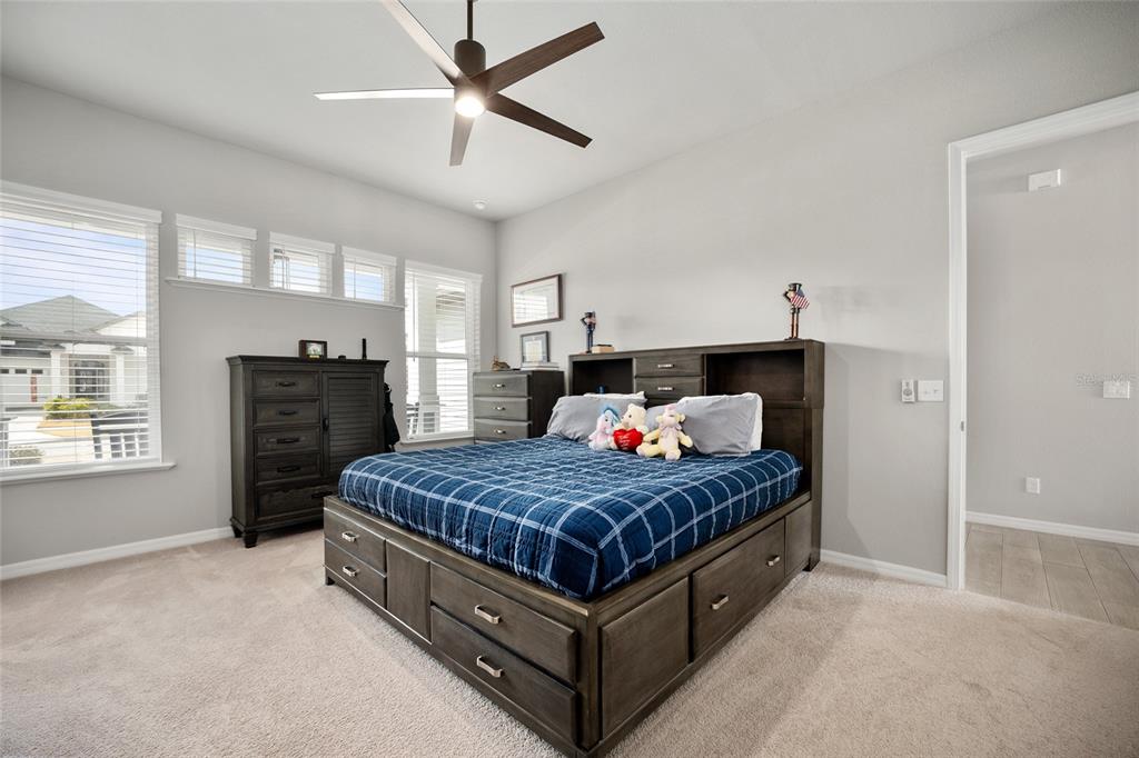 12092 Southwest 29th Place Gainesville, FL 32608 - Photo 14 of 38 a bed room with a bed and window
