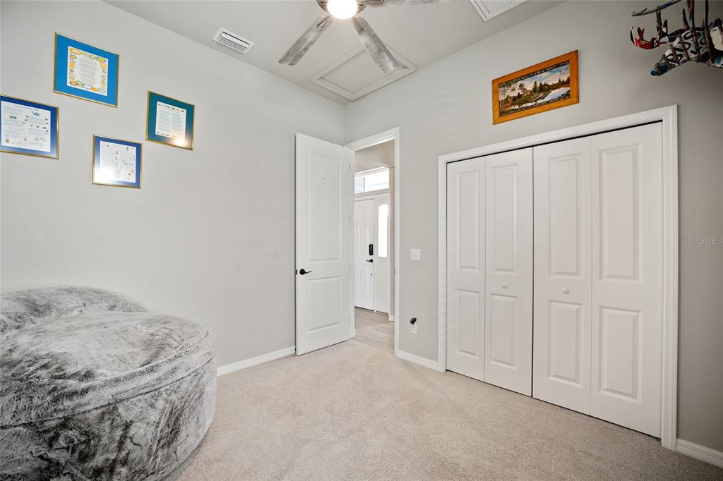 12092 Southwest 29th Place Gainesville, FL 32608 - Photo 20 of 38 a view of bedroom