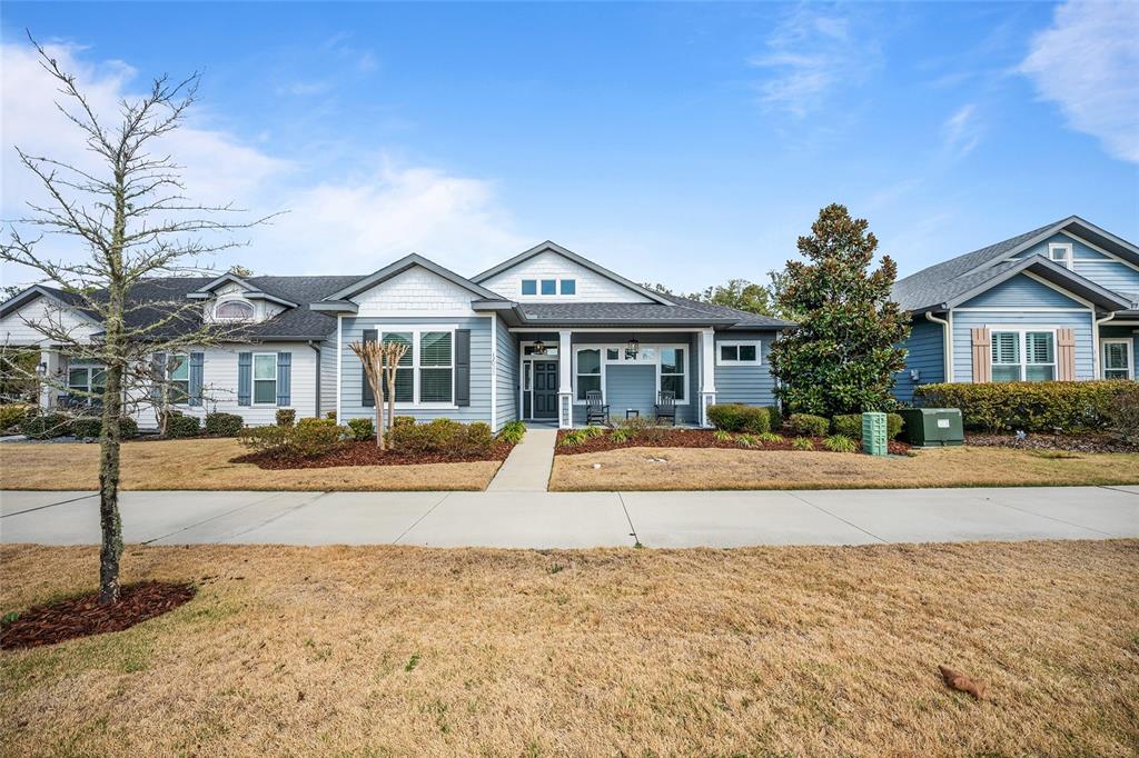 12092 Southwest 29th Place Gainesville, FL 32608 - Photo 2 of 38 a front view of house with yard