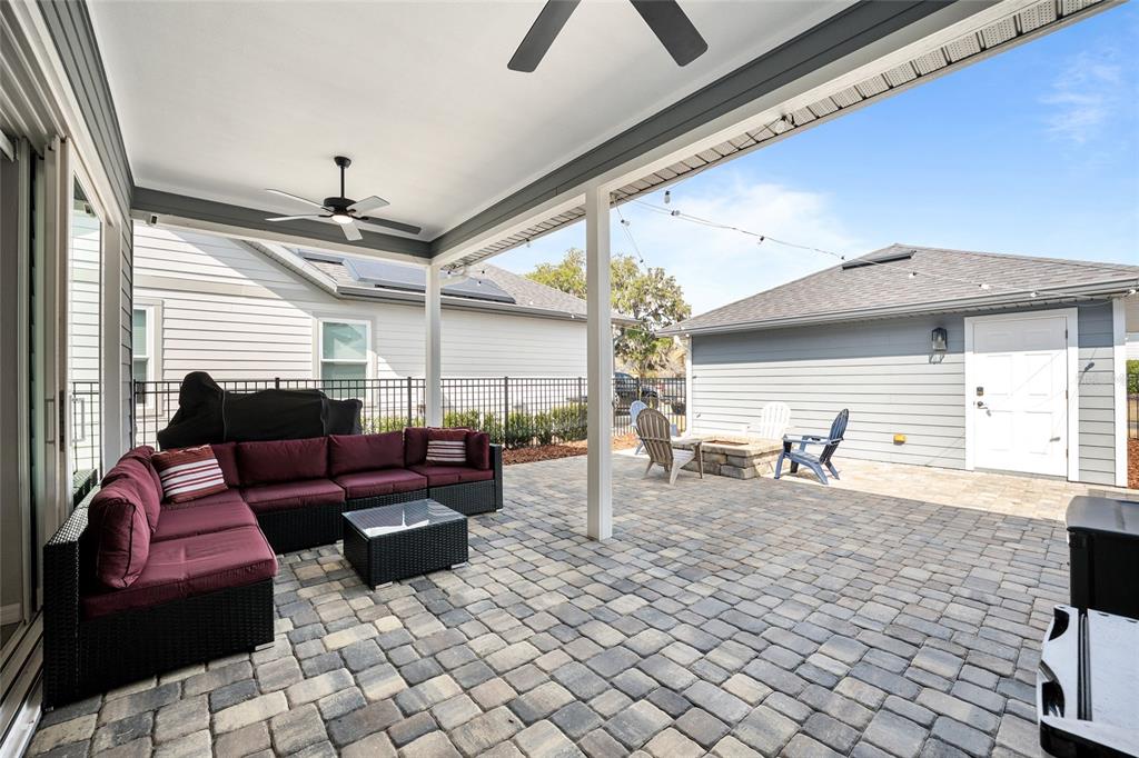 12092 Southwest 29th Place Gainesville, FL 32608 - Photo 29 of 38 a living room with furniture and a large window