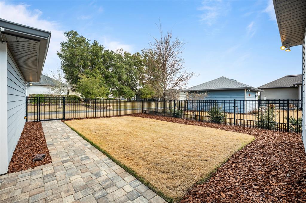 12092 Southwest 29th Place Gainesville, FL 32608 - Photo 31 of 38 a house with trees in front of it