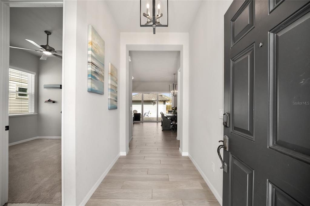 12092 Southwest 29th Place Gainesville, FL 32608 - Photo 4 of 38 a view of a hallway view of a living room