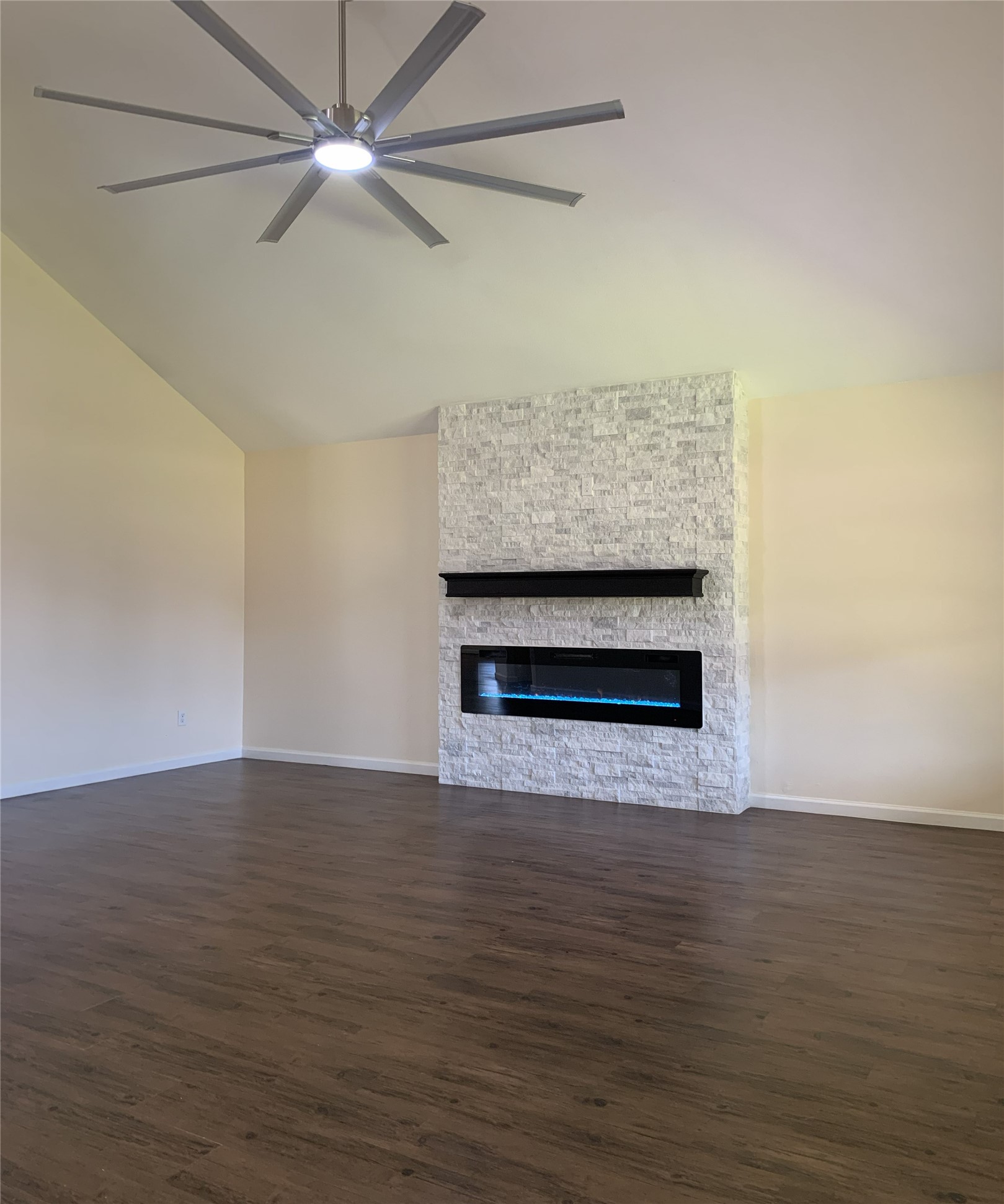 5612 Rainflower Terrace Lane Spring, TX 77389 - Photo 17 of 50 a view of an empty room with wooden floor ceiling fan