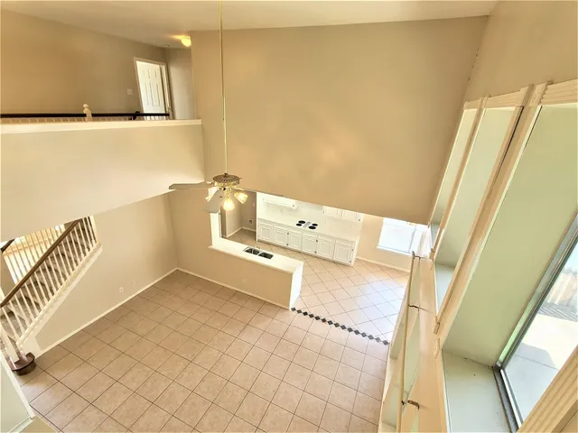 a view of a kitchen with appliances and cabinets